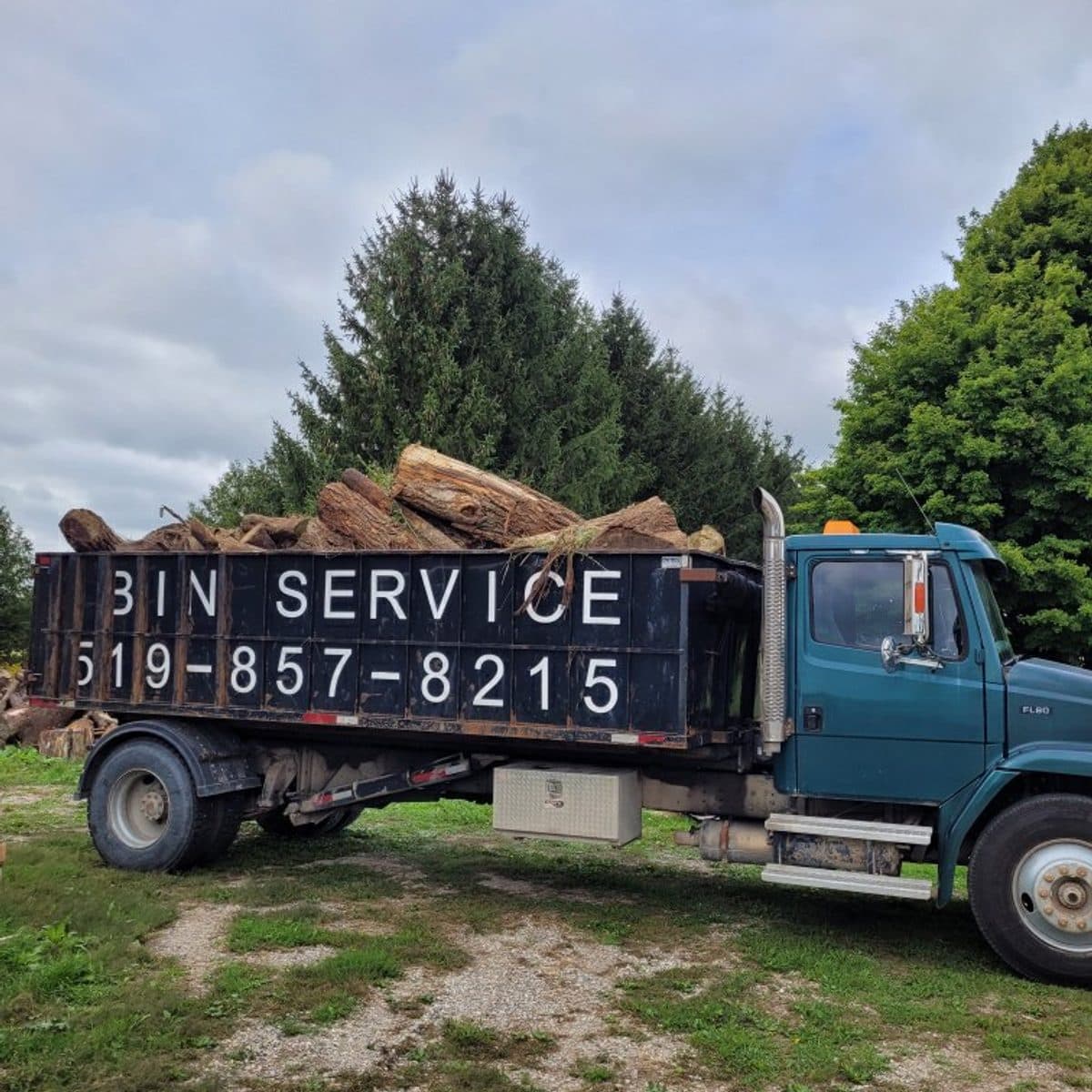 Beaver Tree bin-service truck loaded with cut firewood